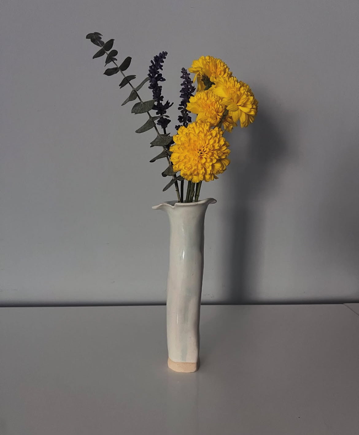 tall and skinny cigarette vase